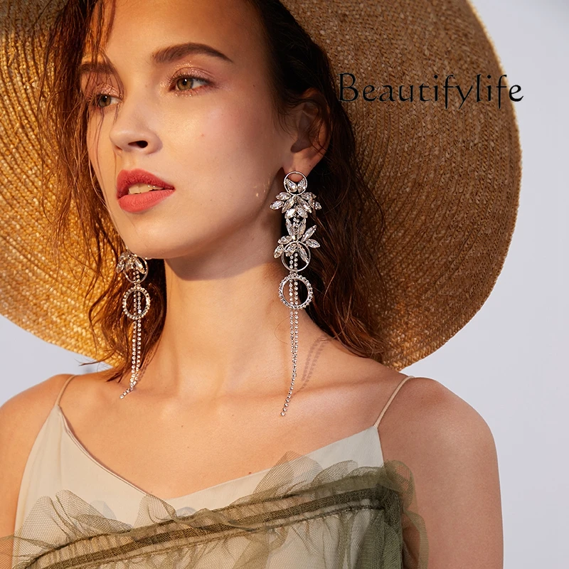 Su Xin 925 silver needle round ring earrings, long fringed earrings, European and American style exaggerated large earrings
Su Xin 925 silver needle round ring earrings, long fringed earrings, European and American style exaggerated large earrings