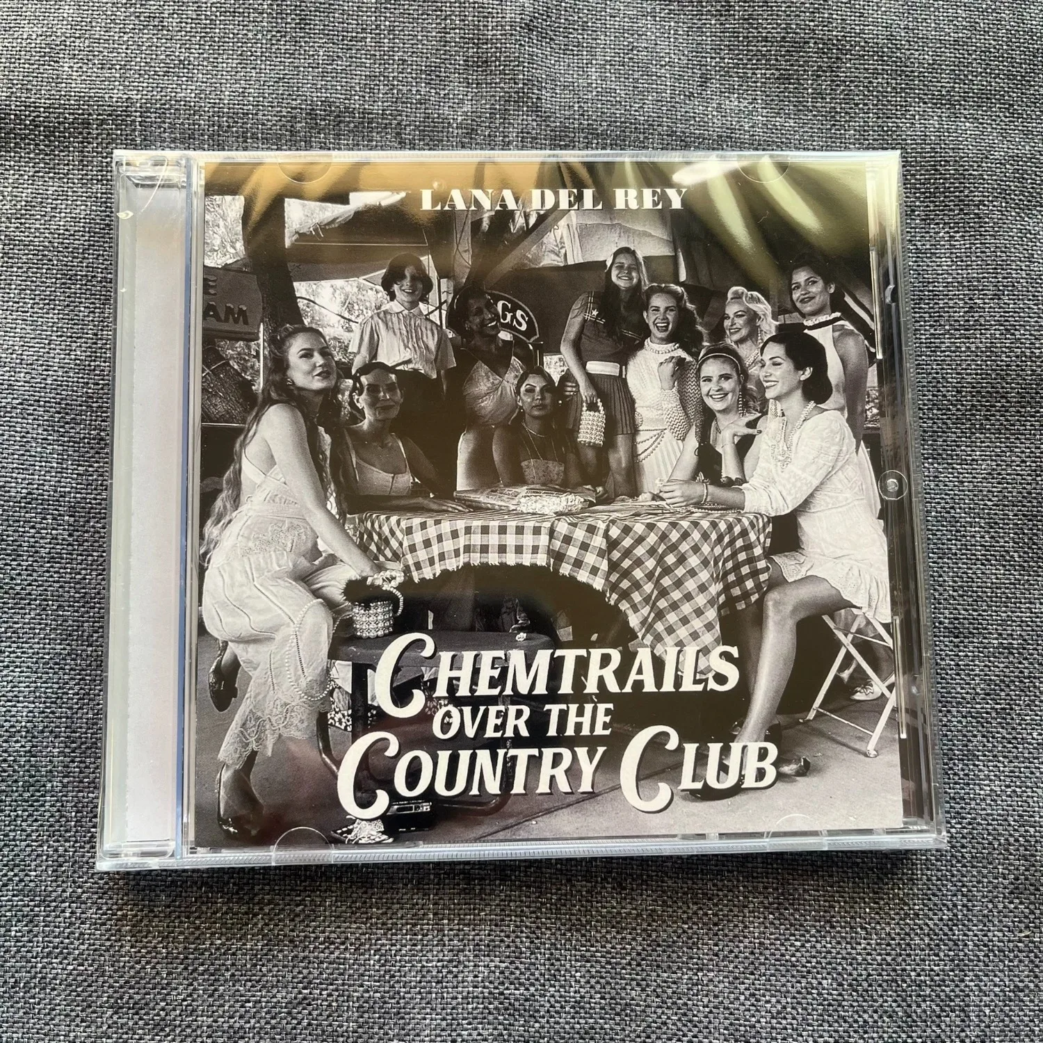 "Chemtrails Over The Country Club" Retro Folk Music Album CD Black & White Film Aesthetic Cover Collectible Music Disc
"Chemtrails Over The Country Club" Retro Folk Music Album CD Black & White Film Aesthetic Cover Collectible Music Disc