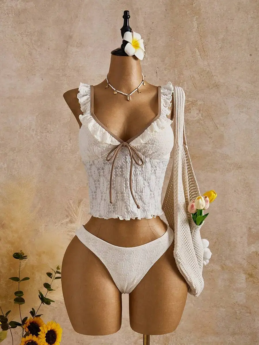 White Ruffled Lace Two Piece Bikini Set With Contrast Trim Crop Top And Triangle Bottom
White Ruffled Lace Two Piece Bikini Set With Contrast Trim Crop Top And Triangle Bottom