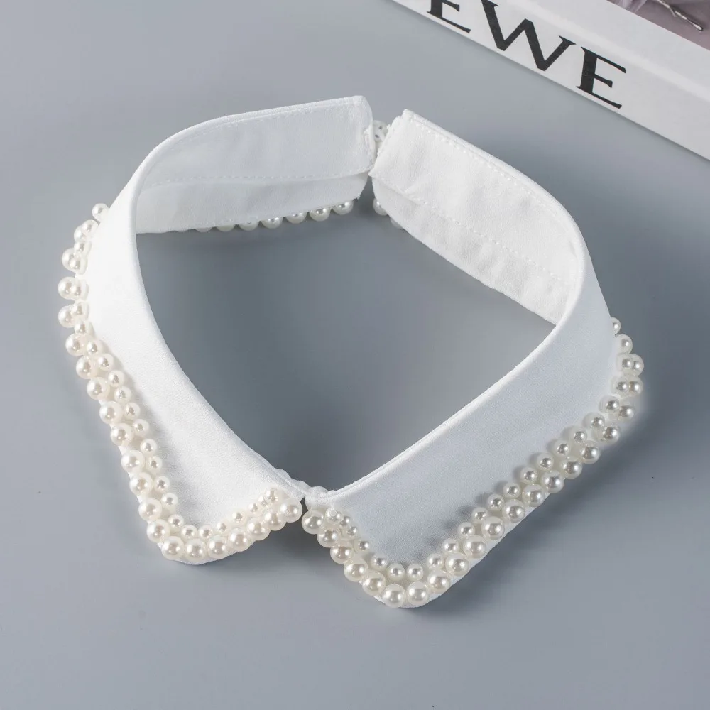 Модный жемчужный воротник-имитация, элегантный съемный воротник, минималистичный высококачественный декор для платья или блузки для женщин
Модный жемчужный воротник-имитация, элегантный съемный воротник, минималистичный высококачественный декор для платья или блузки для женщин