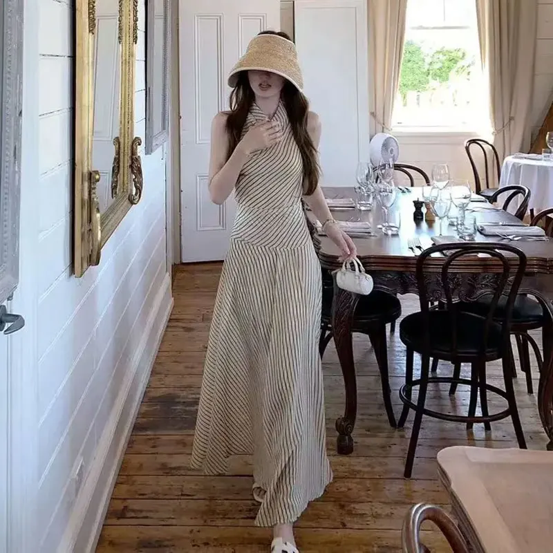 Women Beige Thin Vertical Striped Halter Maxi Dress Sleeveless Slim Fitted Summer Swinging Collar A-Line Long Vacation Sundress
Women Beige Thin Vertical Striped Halter Maxi Dress Sleeveless Slim Fitted Summer Swinging Collar A-Line Long Vacation Sundress