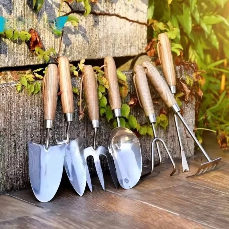 Ergonomic Wooden Handle Heavy Duty Wipe Fork Cultivator Shovel Rake Lawn Mower Stainless Steel Blade Garden Hand Tool Set
Ergonomic Wooden Handle Heavy Duty Wipe Fork Cultivator Shovel Rake Lawn Mower Stainless Steel Blade Garden Hand Tool Set