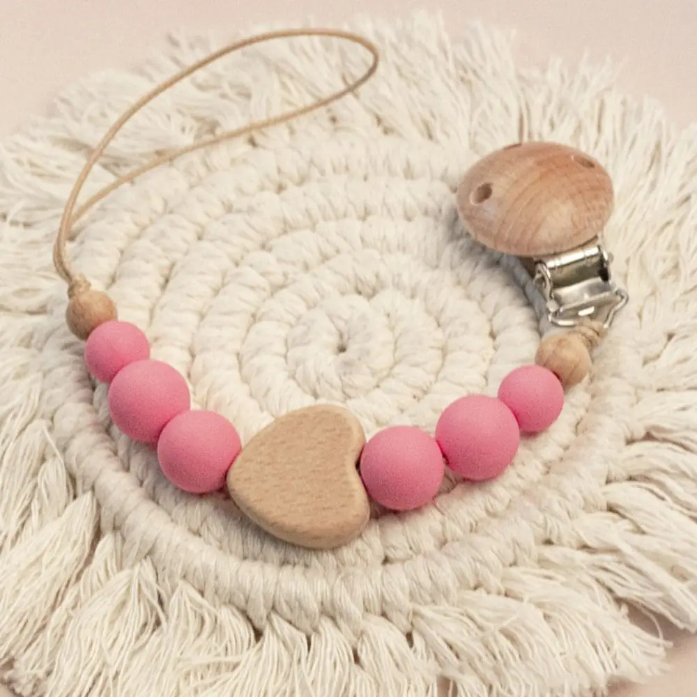 High Quality Silicone Pacifier Clips Anti-drop Wooden Teether Teething Toy Lightweight Gift Pacifier Holder Chain Newborn
High Quality Silicone Pacifier Clips Anti-drop Wooden Teether Teething Toy Lightweight Gift Pacifier Holder Chain Newborn