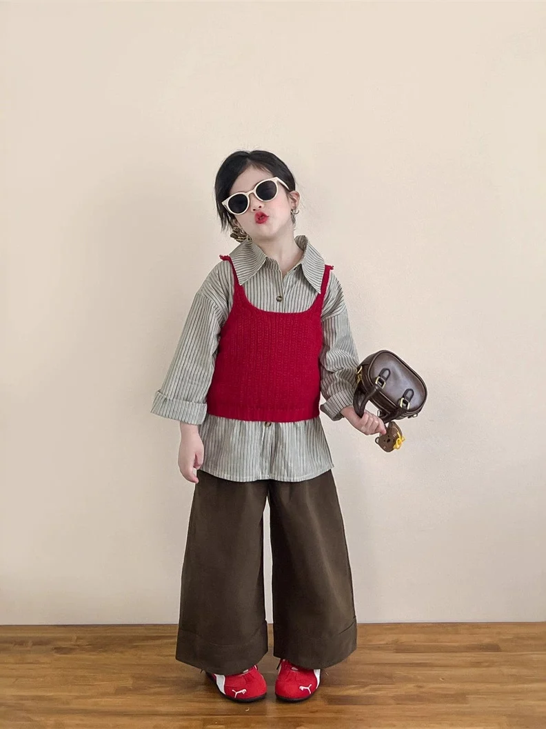 Комплект для девочек: вязаный жилет, широкие брюки и футболка, осенний модный корейский стиль, полосатая школьная форма, детская одежда
Комплект для девочек: вязаный жилет, широкие брюки и футболка, осенний модный корейский стиль, полосатая школьная форма, детская одежда