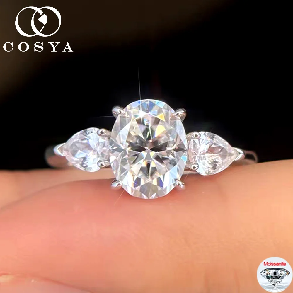 Кольцо COSYA с овальным муассанитом 7*8 мм, 2 карата, для женщин, 100% серебро S925, с тремя камнями, имитация бриллианта, обручальное кольцо, изысканные сверкающие ювелирные изделия
Кольцо COSYA с овальным муассанитом 7*8 мм, 2 карата, для женщин, 100% серебро S925, с тремя камнями, имитация бриллианта, обручальное кольцо, изысканные сверкающие ювелирные изделия