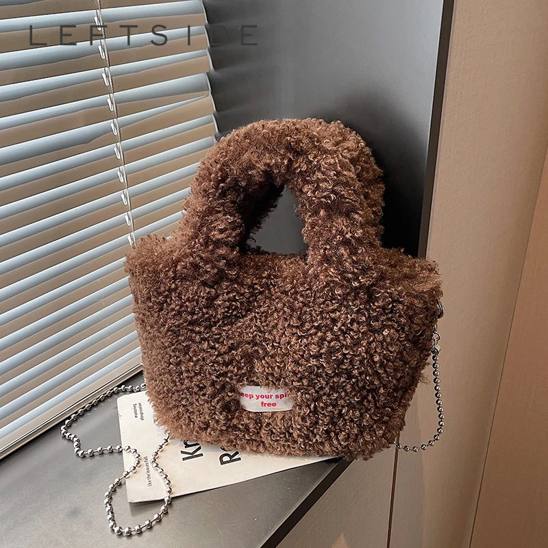 Левая сторона, маленькие женские сумки на плечо, тренд 2025, роскошные брендовые плюшевые сумки и кошельки, мягкая теплая зимняя сумка через плечо с цепочкой
Левая сторона, маленькие женские сумки на плечо, тренд 2025, роскошные брендовые плюшевые сумки и кошельки, мягкая теплая зимняя сумка через плечо с цепочкой