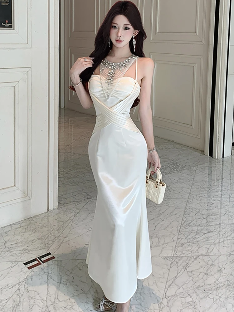 White Satin Patchwork Diamons Neck-mounted Sexy Women's Dress 2026 Korean Vintage Luxury Party Dress Summer Elegant Night Dress
White Satin Patchwork Diamons Neck-mounted Sexy Women's Dress 2026 Korean Vintage Luxury Party Dress Summer Elegant Night Dress