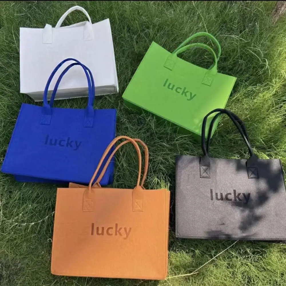 Portable Letter Felt Bag Gift Bag Solid Color Felt Handbag Large Capacity Reusable Festival
Portable Letter Felt Bag Gift Bag Solid Color Felt Handbag Large Capacity Reusable Festival