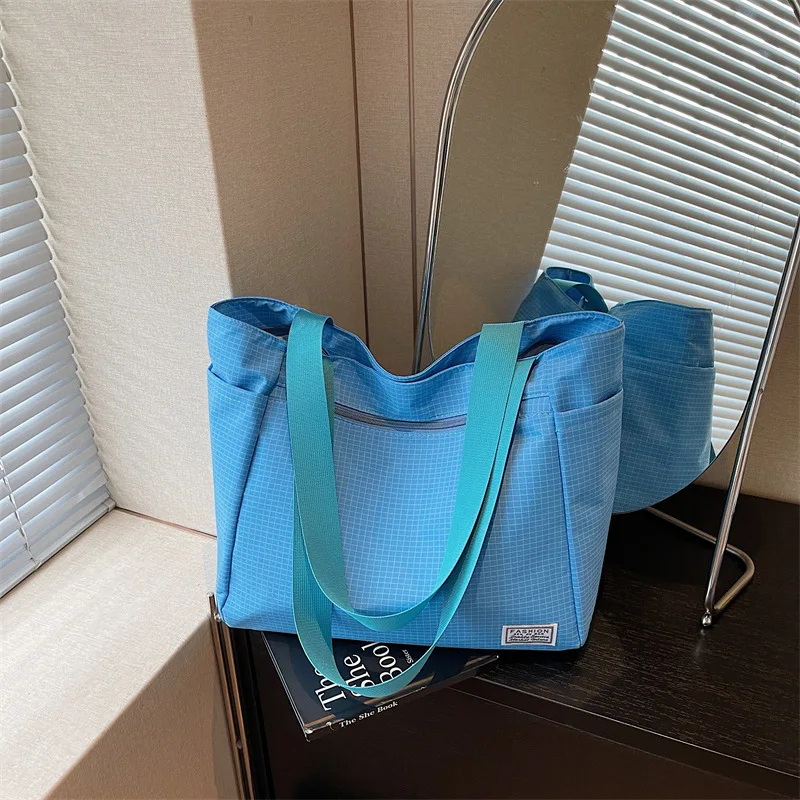 2026 New Women's Shoulder Bag Lightweight and Versatile Women's Handbag Casual and Versatile Large Capacity Shopping Tote Bag
2026 New Women's Shoulder Bag Lightweight and Versatile Women's Handbag Casual and Versatile Large Capacity Shopping Tote Bag