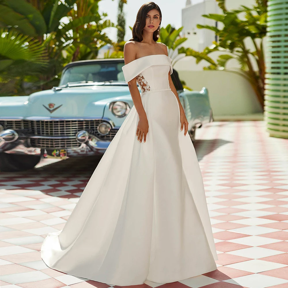 Elegant Off-the-Shoulder Satin Wedding Dress with Lace Decoration Customized robe de mariée Detachable Train Bridal Gowns 2026
Elegant Off-the-Shoulder Satin Wedding Dress with Lace Decoration Customized robe de mariée Detachable Train Bridal Gowns 2026