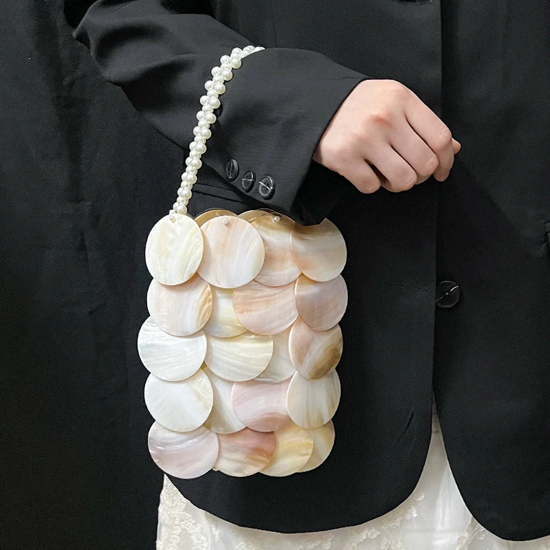 European and American style niche design new handmade bright color bucket bag woven imitation pearl pendant dinner party handba
European and American style niche design new handmade bright color bucket bag woven imitation pearl pendant dinner party handba