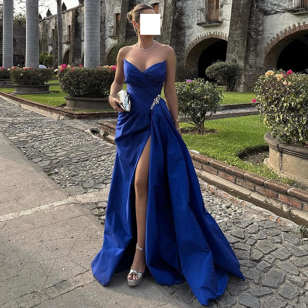 Floor Length Saudi Evening Gowns Straight Sleeveless Satin Strapless Floor Length Panel Train Solid Blue Party Gowns Crystal
Floor Length Saudi Evening Gowns Straight Sleeveless Satin Strapless Floor Length Panel Train Solid Blue Party Gowns Crystal