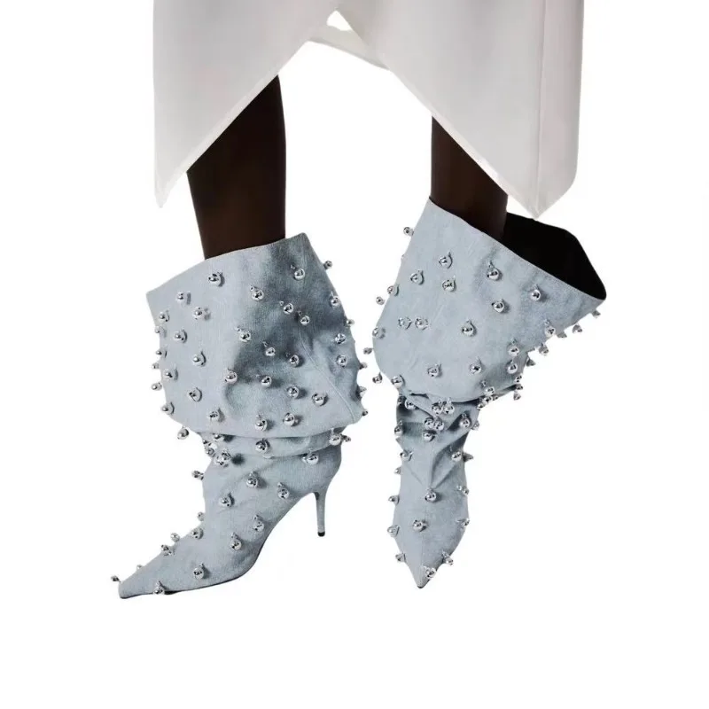 Европейские и американские модные женские модные остроконечные сапоги до колена на тонком высоком каблуке, большой окружность, сложенные заклепками, пикантные сапоги для девочек
Европейские и американские модные женские модные остроконечные сапоги до колена на тонком высоком каблуке, большой окружность, сложенные заклепками, пикантные сапоги для девочек