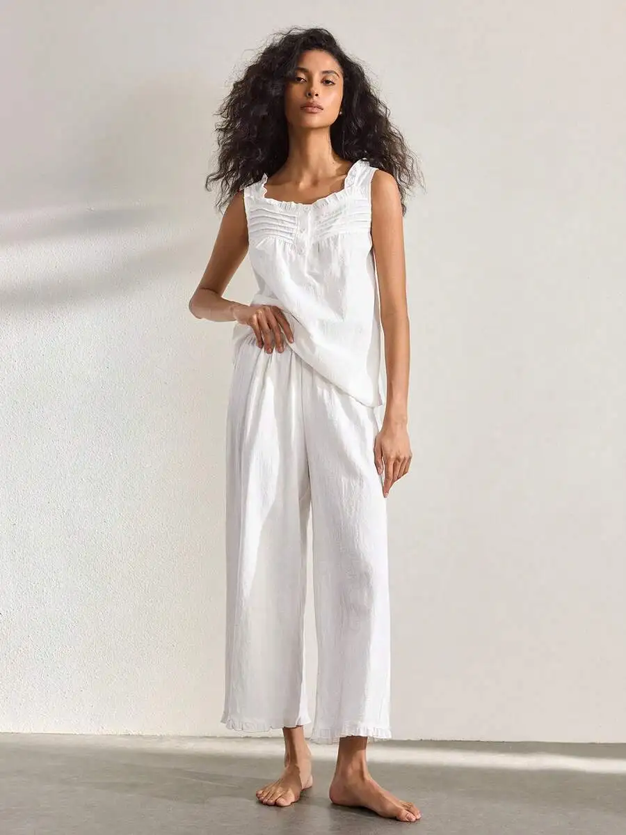 Women Solid Color Frill Trim Sleeveless Top And Wide Leg Pants Pajama Set
Women Solid Color Frill Trim Sleeveless Top And Wide Leg Pants Pajama Set
