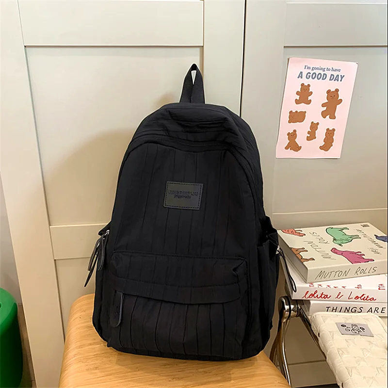 Solid color backpack college junior high school girls ins college school school bag versatile lightweight girl travel backpack
Solid color backpack college junior high school girls ins college school school bag versatile lightweight girl travel backpack