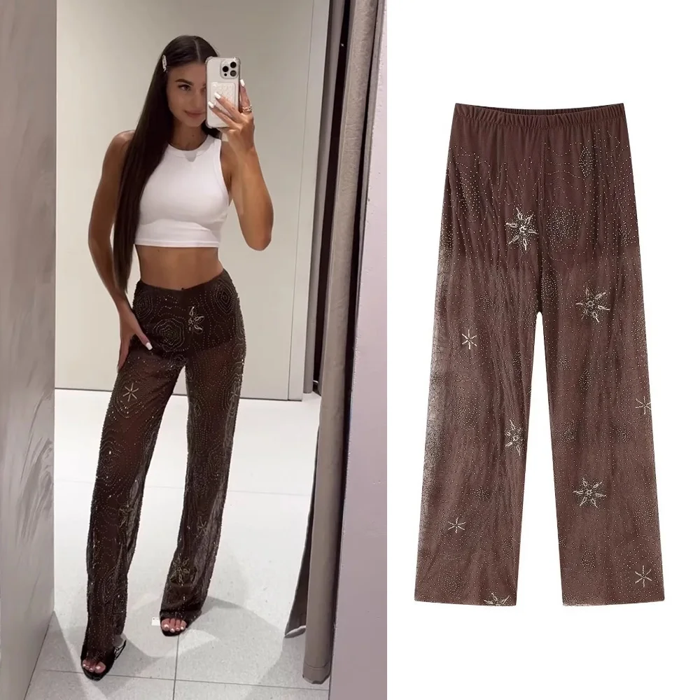 Summer Shiny Sequins Wide Leg Pants Women Elegant Loose Beading Snowflake See Through Trousers 2025 New Lady Holiday Outerwear
Summer Shiny Sequins Wide Leg Pants Women Elegant Loose Beading Snowflake See Through Trousers 2025 New Lady Holiday Outerwear