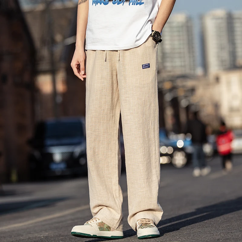 Мужские летние льняные хлопковые брюки в полоску, свободные, прямого кроя, повседневные, в японском ретро-стиле, комфортные, дышащие, с охлаждающим эффектом
Мужские летние льняные хлопковые брюки в полоску, свободные, прямого кроя, повседневные, в японском ретро-стиле, комфортные, дышащие, с охлаждающим эффектом