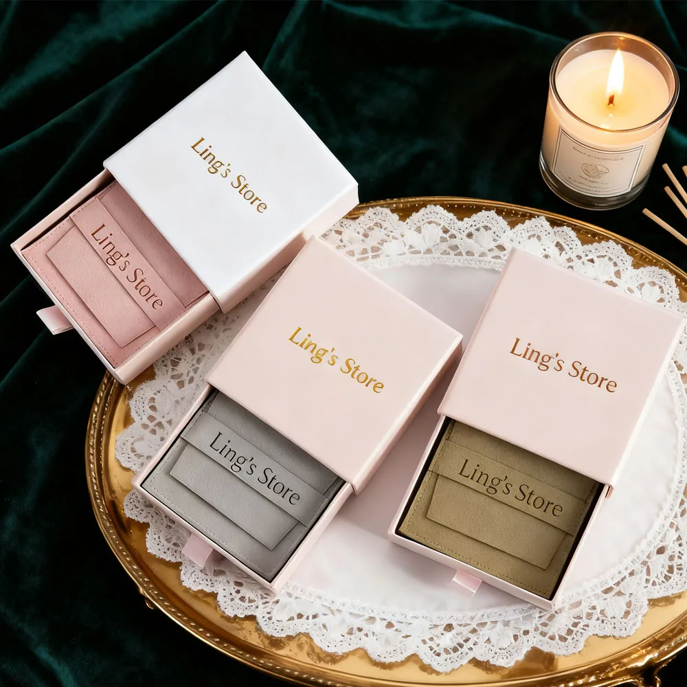Custom Logo 7x7X1.7cm Pink Cardboard Jewelry Drawers Boxes 6.2x6.2cm Microfiber Gift bags Earrings Rings Necklace Organizer Case
Custom Logo 7x7X1.7cm Pink Cardboard Jewelry Drawers Boxes 6.2x6.2cm Microfiber Gift bags Earrings Rings Necklace Organizer Case