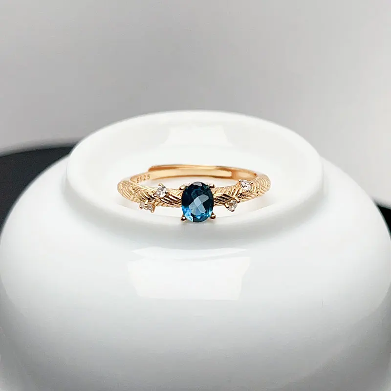 VVS Grade London Blue Topaz Ring 4mm*5mm Natural Topaz 925 Silver Jewelry with 3 Layers 18K Gold Plating
VVS Grade London Blue Topaz Ring 4mm*5mm Natural Topaz 925 Silver Jewelry with 3 Layers 18K Gold Plating