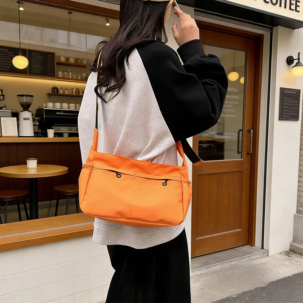Korean Style Orange Drawstring Crossbody Bag for Women, Casual Nylon Shoulder Bag for Daily Commute & Street Style
Korean Style Orange Drawstring Crossbody Bag for Women, Casual Nylon Shoulder Bag for Daily Commute & Street Style