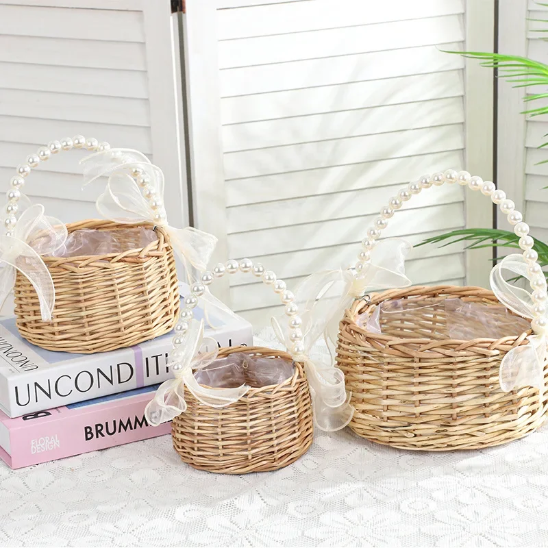 One wicker rattan flower child Basket with Pearl handle and bow Hand woven Easter basket Wicker basket for Weddings (brown)
One wicker rattan flower child Basket with Pearl handle and bow Hand woven Easter basket Wicker basket for Weddings (brown)