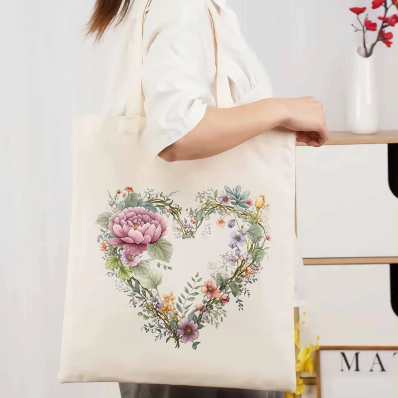 Cream floral heart pattern canvas tote bag for everyday use and shopping
Cream floral heart pattern canvas tote bag for everyday use and shopping