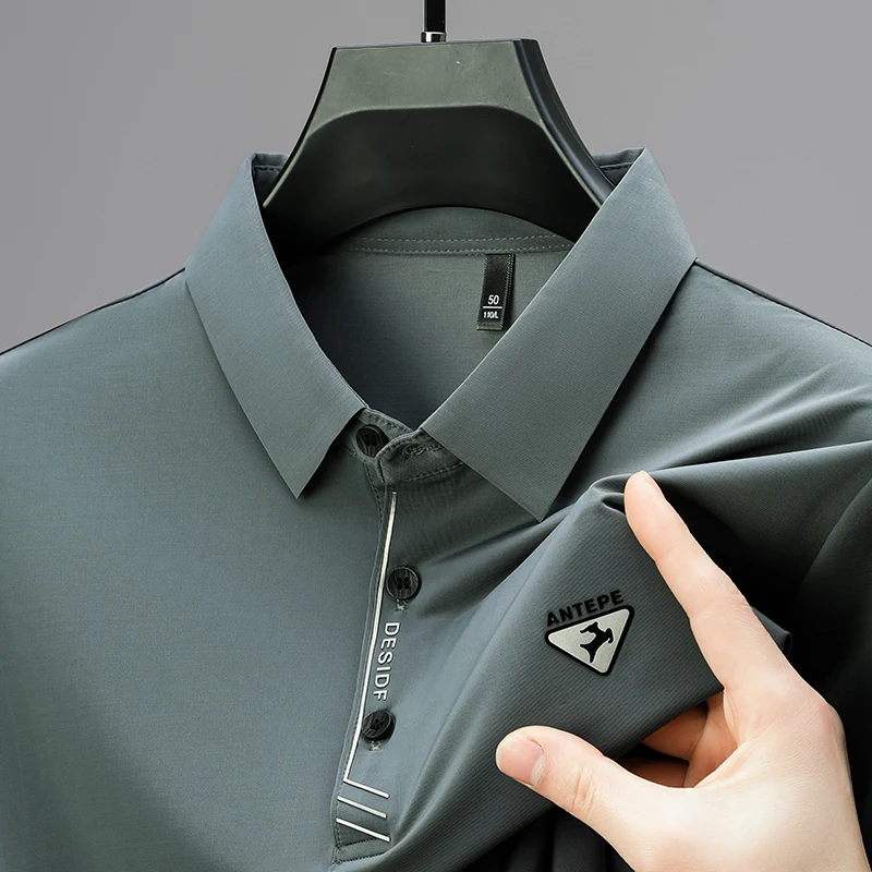 Мода Марка Мужская Рубашка Polo Summer Polo дизайн пуговицы значки Половина рукава воздухопроницаемая Настройка Удобно футболка для отдыха
Мода Марка Мужская Рубашка Polo Summer Polo дизайн пуговицы значки Половина рукава воздухопроницаемая Настройка Удобно футболка для отдыха