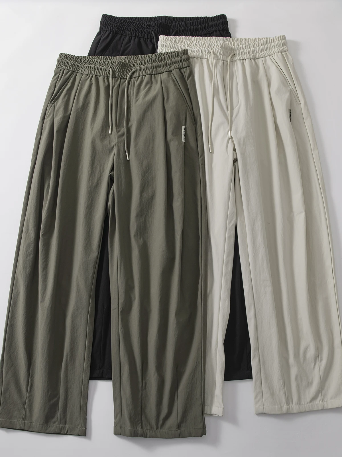 Мужские повседневные брюки прямого кроя с эластичными широкими штанинами, тонкие однотонные свободные длинные брюки, плиссированные, с 3D-кроем, в стиле «папины брюки»
Мужские повседневные брюки прямого кроя с эластичными широкими штанинами, тонкие однотонные свободные длинные брюки, плиссированные, с 3D-кроем, в стиле «папины брюки»