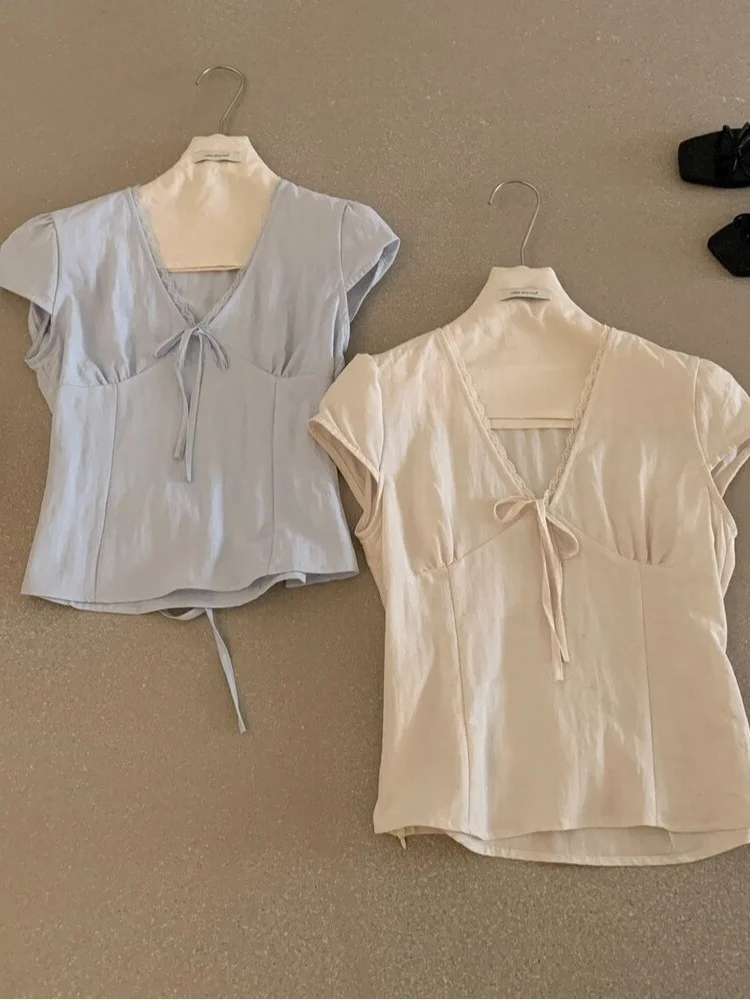 Sweet Korean Sle Blue Ruffle V-Ne ort Sve irt Women's Summer New Small Size Waist-Cinching Top Commute Sle
Sweet Korean Sle Blue Ruffle V-Ne ort Sve irt Women's Summer New Small Size Waist-Cinching Top Commute Sle