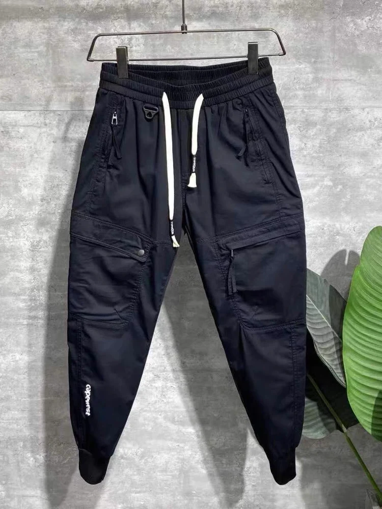 Летние повседневные брюки Bla, мужская модная высококачественная рабочая одежда, молодежные универсальные брюки узкого кроя, брюки с эластичной резинкой на талии и манжетами
Летние повседневные брюки Bla, мужская модная высококачественная рабочая одежда, молодежные универсальные брюки узкого кроя, брюки с эластичной резинкой на талии и манжетами