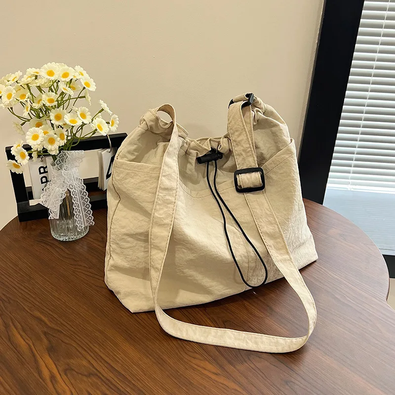 Women's Drawstring Canvas Tote Bag, Large Capacity Adjustable Shoulder Crossbody Bag, Casual Daily & Travel Handbag
Women's Drawstring Canvas Tote Bag, Large Capacity Adjustable Shoulder Crossbody Bag, Casual Daily & Travel Handbag