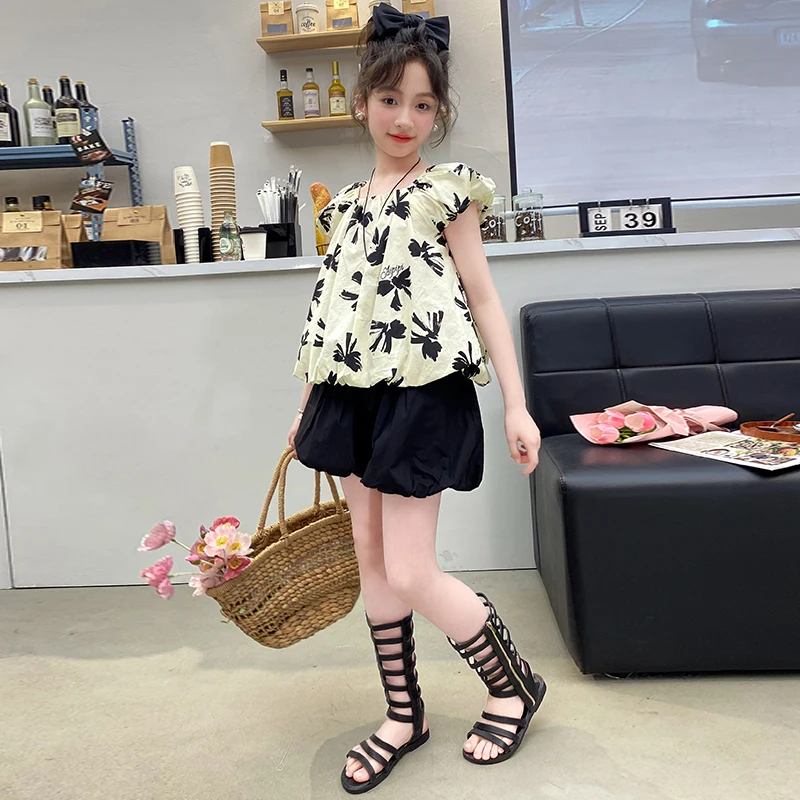 Summer Girls Bow Print Top Casual Fashion Lantern Shorts Combination 2piece Childrens Trendy Cool Set Princess Birthday Clothing
Summer Girls Bow Print Top Casual Fashion Lantern Shorts Combination 2piece Childrens Trendy Cool Set Princess Birthday Clothing