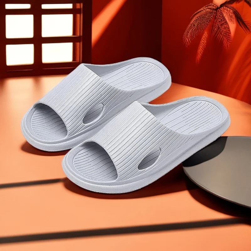 New summer home slippers soft bottom couple men and women non-slip home bathroom sandals step on shit feeling
New summer home slippers soft bottom couple men and women non-slip home bathroom sandals step on shit feeling
