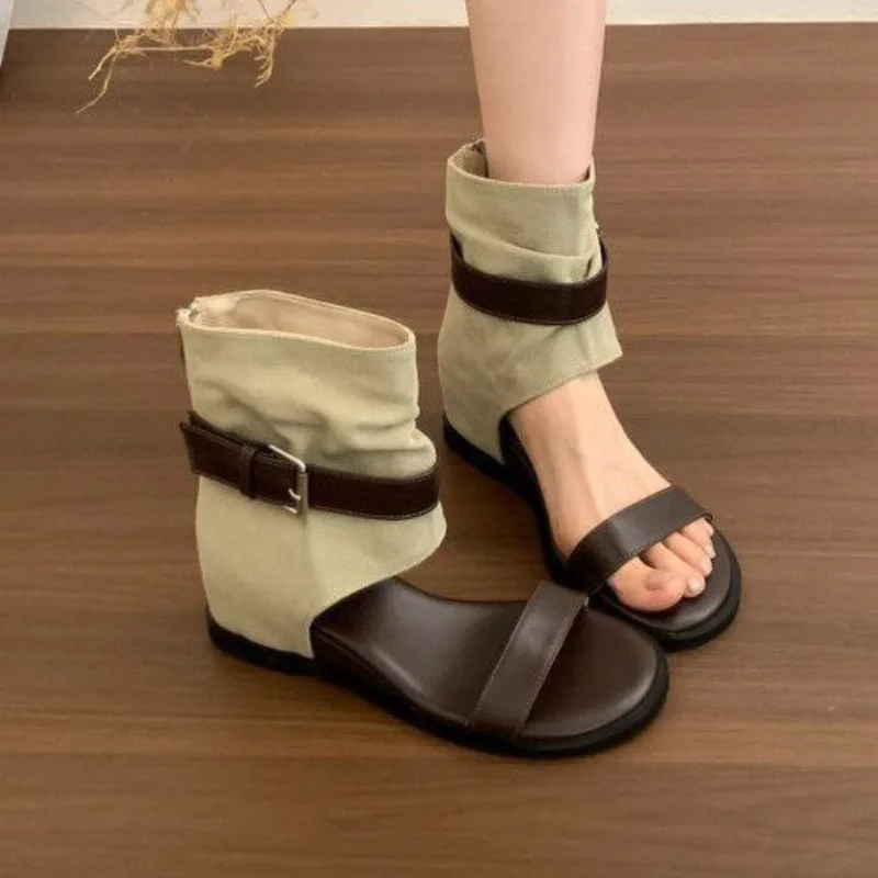 French Niche High Wedge Cool Boots for Women New One-line Strap Versatile Roman Sandals
French Niche High Wedge Cool Boots for Women New One-line Strap Versatile Roman Sandals