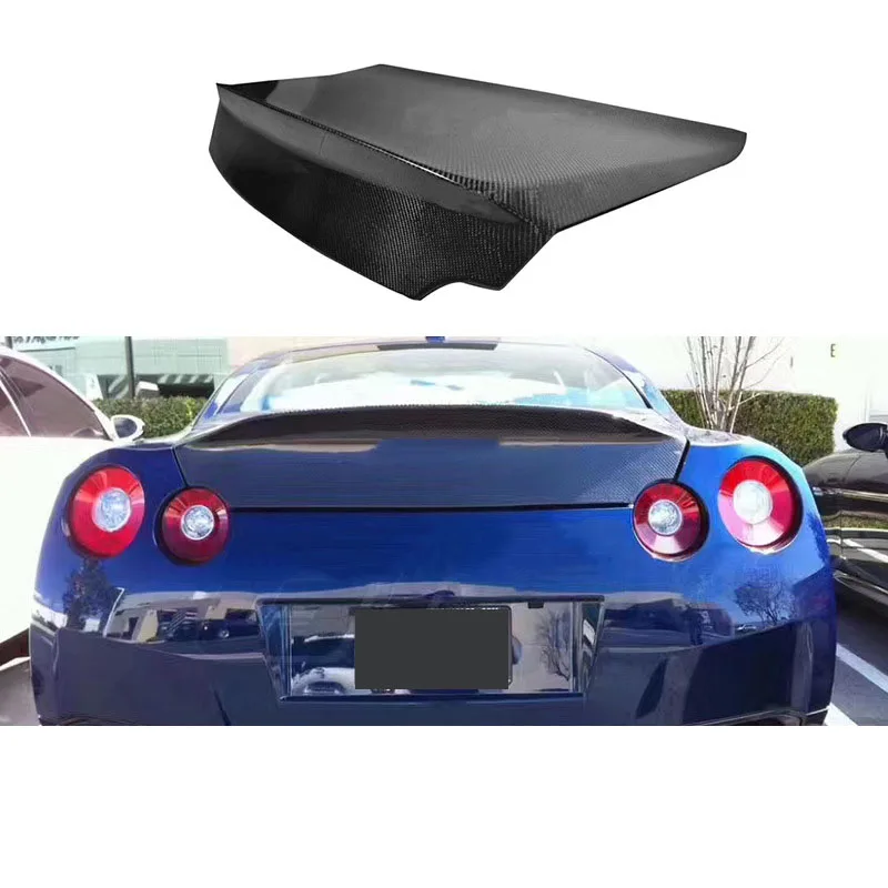 Suitable for Nissan GTR35 tail lid Carbon fiber R35 modified hip tail lid surrounds the trunk lid
Suitable for Nissan GTR35 tail lid Carbon fiber R35 modified hip tail lid surrounds the trunk lid