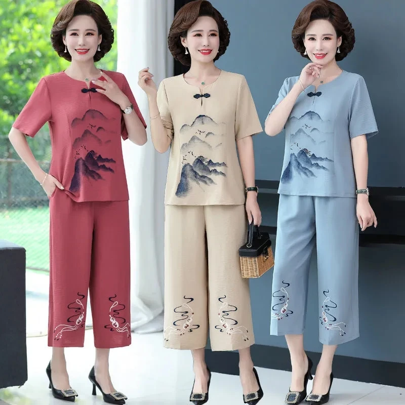 Middle-aged Mother Wear Chiffon Shirt Womens 2022 Summer New Chinese Style Large Size Loose Short-sleeve Two-piece Sets Suits
Middle-aged Mother Wear Chiffon Shirt Womens 2022 Summer New Chinese Style Large Size Loose Short-sleeve Two-piece Sets Suits