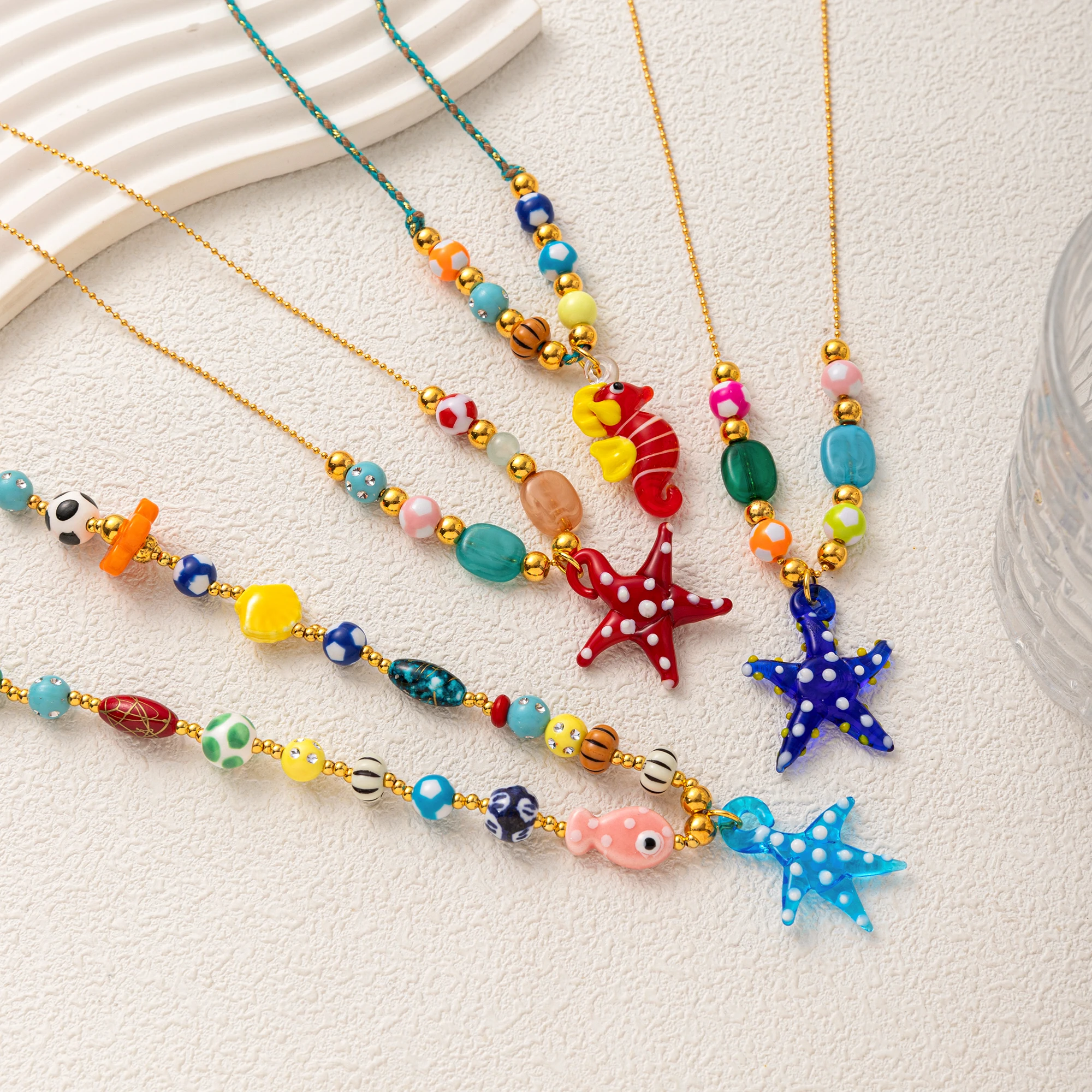 Seaside elements cute and fresh ins style glass seahorse starfish small fish accessories Necklaces for women jewelry
Seaside elements cute and fresh ins style glass seahorse starfish small fish accessories Necklaces for women jewelry