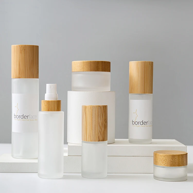 Luxury Cosmetics Packaging Glass Bottle Sets Bamboo Lid Cream Jar and Pump Spray Bottle Set Skincare Face Cream Lotion Bottle
Luxury Cosmetics Packaging Glass Bottle Sets Bamboo Lid Cream Jar and Pump Spray Bottle Set Skincare Face Cream Lotion Bottle