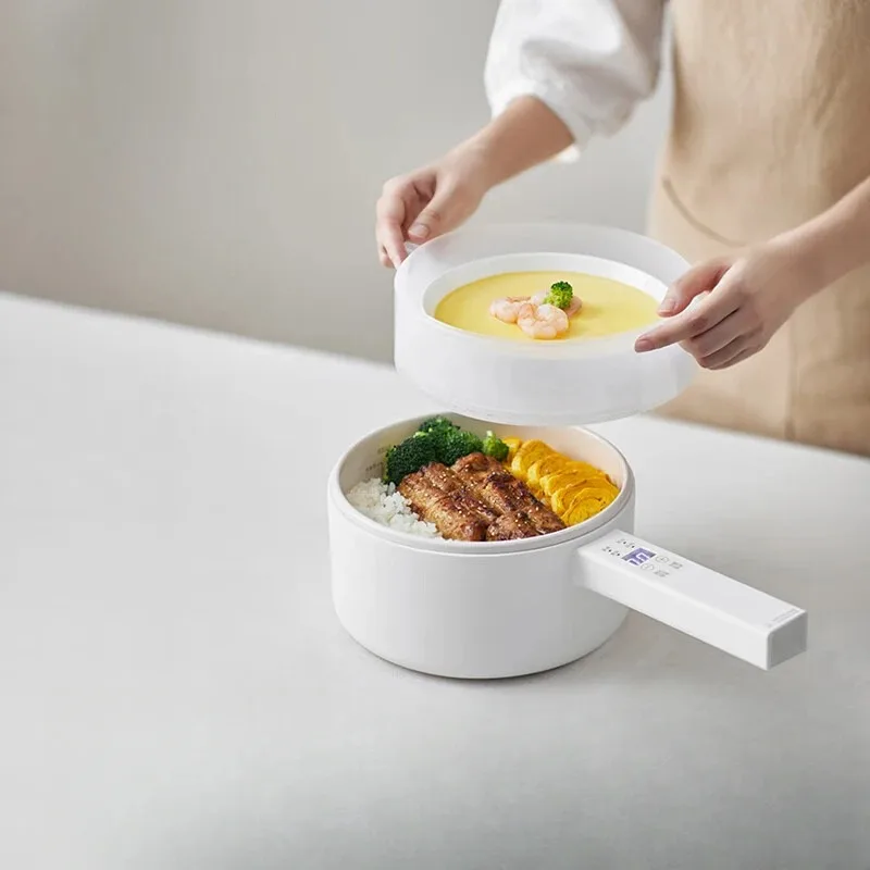 Electric cooking pot Household dormitory Student multi-functional integrated small electric pot Electric frying
Electric cooking pot Household dormitory Student multi-functional integrated small electric pot Electric frying
