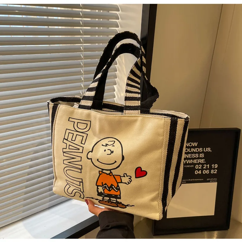 Симпатичная сумка Snoopy в полоску с цветными блоками, новая холщовая сумка на плечо для девочек, сумка-тоут для хранения букв с героями мультфильмов
Симпатичная сумка Snoopy в полоску с цветными блоками, новая холщовая сумка на плечо для девочек, сумка-тоут для хранения букв с героями мультфильмов