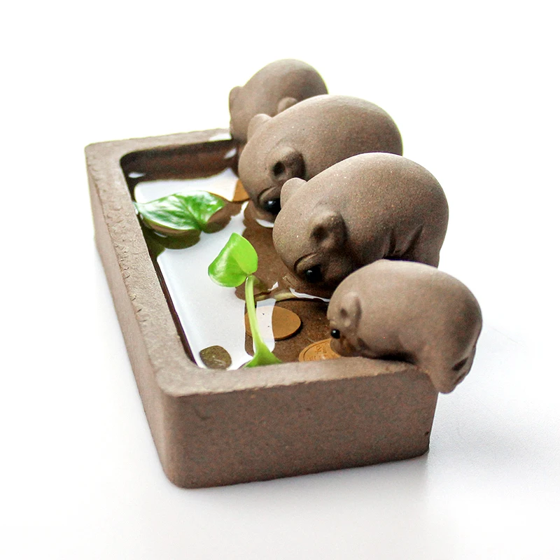 Tea set accessories small boutique, purple sand can raise tea to play with pigs drinking water spraying water to change color
Tea set accessories small boutique, purple sand can raise tea to play with pigs drinking water spraying water to change color