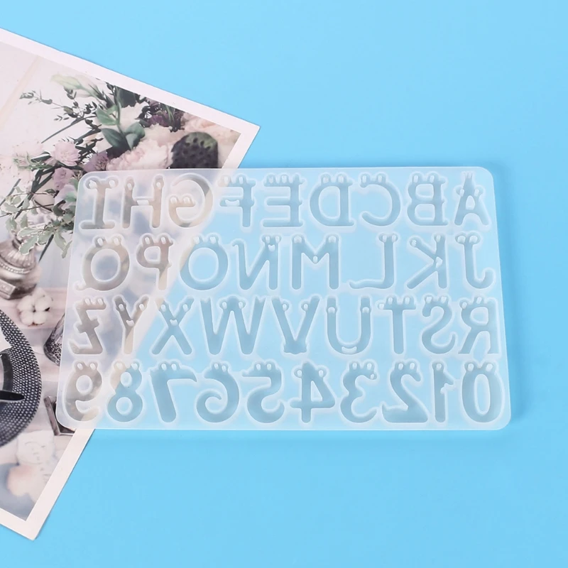 Cartoon Face Crystal Epoxy Resin Mold English Letters Number Pendant Casting Silicone Mould DIY Crafts Jewelry
Cartoon Face Crystal Epoxy Resin Mold English Letters Number Pendant Casting Silicone Mould DIY Crafts Jewelry