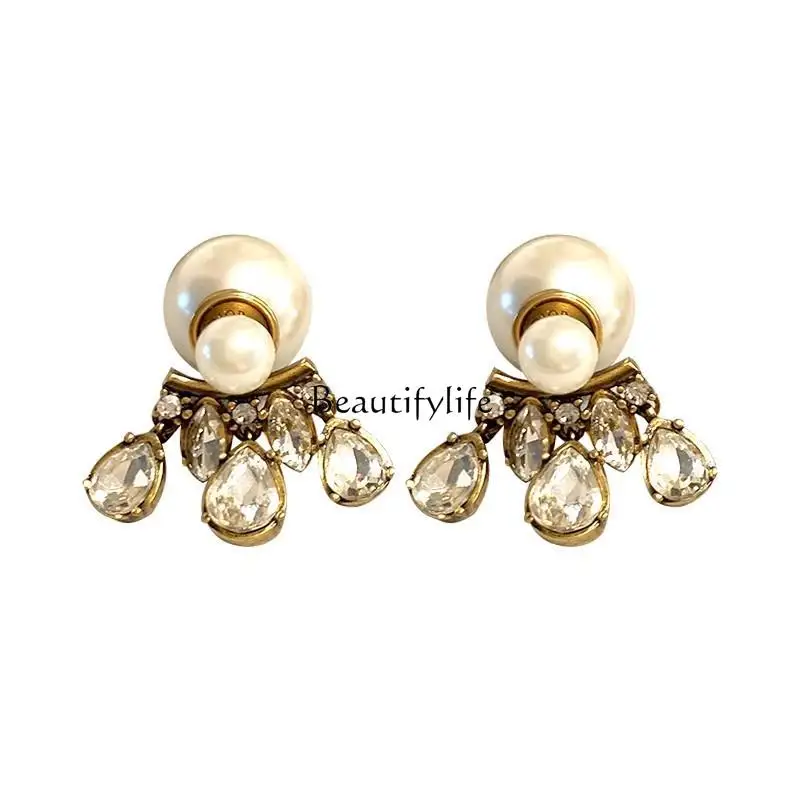This style tassel flash diamond pearl earrings sterling silver light luxury high-end exquisite temperament earrings
This style tassel flash diamond pearl earrings sterling silver light luxury high-end exquisite temperament earrings