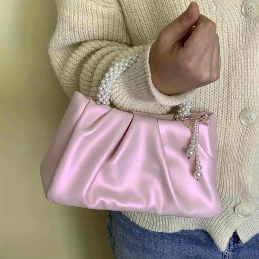Elegant pink pleated pearl embellished clutch bag - magnetic closure, imitation leather, suitable for weddings and parties
Elegant pink pleated pearl embellished clutch bag - magnetic closure, imitation leather, suitable for weddings and parties