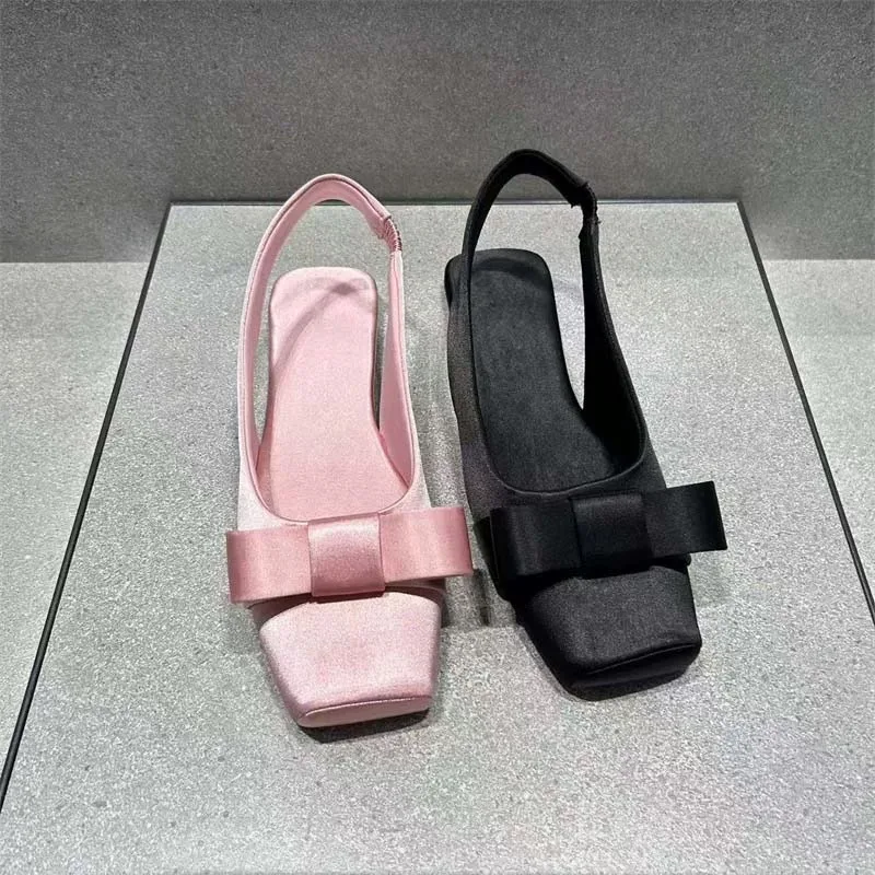 Leather satin French square head bow flat bottom back strap bag head sandals women's 2025 new spring and summer single shoes
Leather satin French square head bow flat bottom back strap bag head sandals women's 2025 new spring and summer single shoes