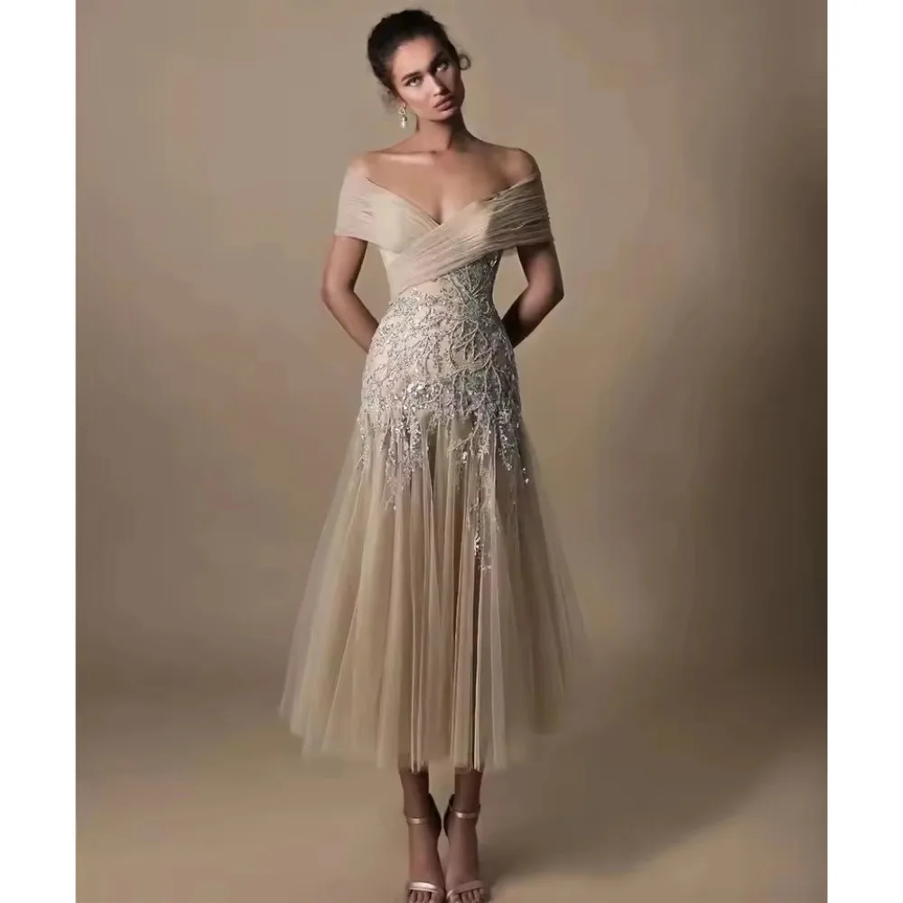 Champagne Tulle Cocktail Dresses Off Shoulder Glitter Beads Prom Gowns Charming Tea Length Customized Wedding Party Guest Gowns
Champagne Tulle Cocktail Dresses Off Shoulder Glitter Beads Prom Gowns Charming Tea Length Customized Wedding Party Guest Gowns