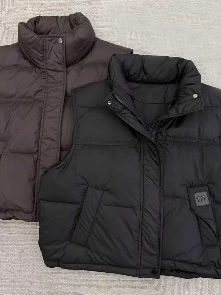 Faionable Thiened Svel Stand Collar Jaet Women's Winter New Sle High-End Zipper down Cotton Vest Outerwear
Faionable Thiened Svel Stand Collar Jaet Women's Winter New Sle High-End Zipper down Cotton Vest Outerwear