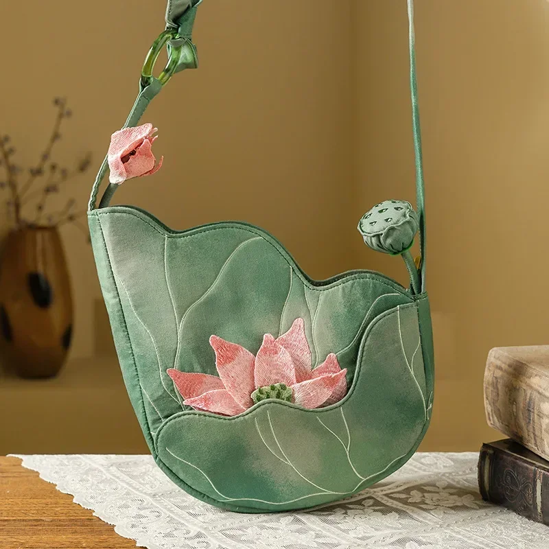Elegant Chinese Style Lotus Leaf Floral Embroidery Shoulder Bag for Women Designer Handbag Fashionable Female Bag New Collection
Elegant Chinese Style Lotus Leaf Floral Embroidery Shoulder Bag for Women Designer Handbag Fashionable Female Bag New Collection