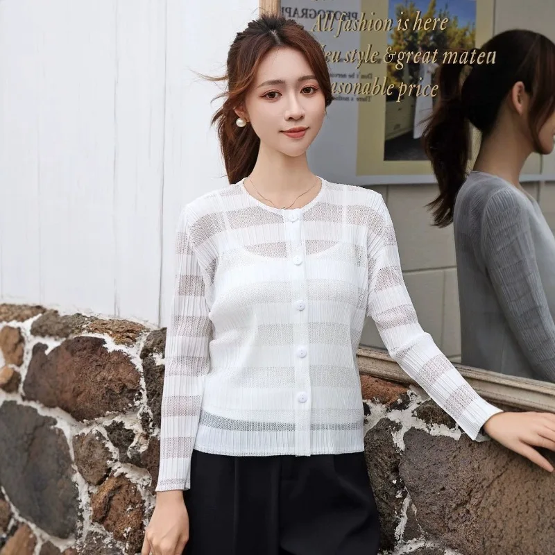 Miyake Pleated Hollow Jacket Women 2026Summer New Round Neck Thin Breathable Sun-Protective Air Conditioning Shirt Outerwear
Miyake Pleated Hollow Jacket Women 2026Summer New Round Neck Thin Breathable Sun-Protective Air Conditioning Shirt Outerwear