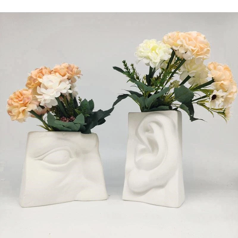 Matt White Abstract Human Face Vase Glasses Mouth Ears Nose Ceramic Table Top Living Room Decoration Wedding Gift
Matt White Abstract Human Face Vase Glasses Mouth Ears Nose Ceramic Table Top Living Room Decoration Wedding Gift